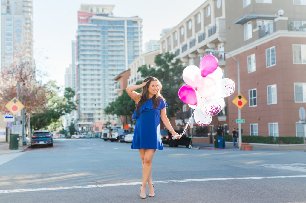 Downtown San Diego brand photo shoot with colorful pink balloons