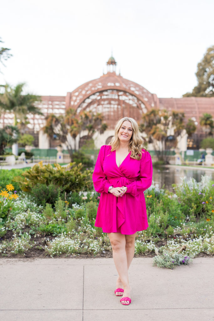 Women at Balboa Park wearing hot pink for brand photos in San Diego
